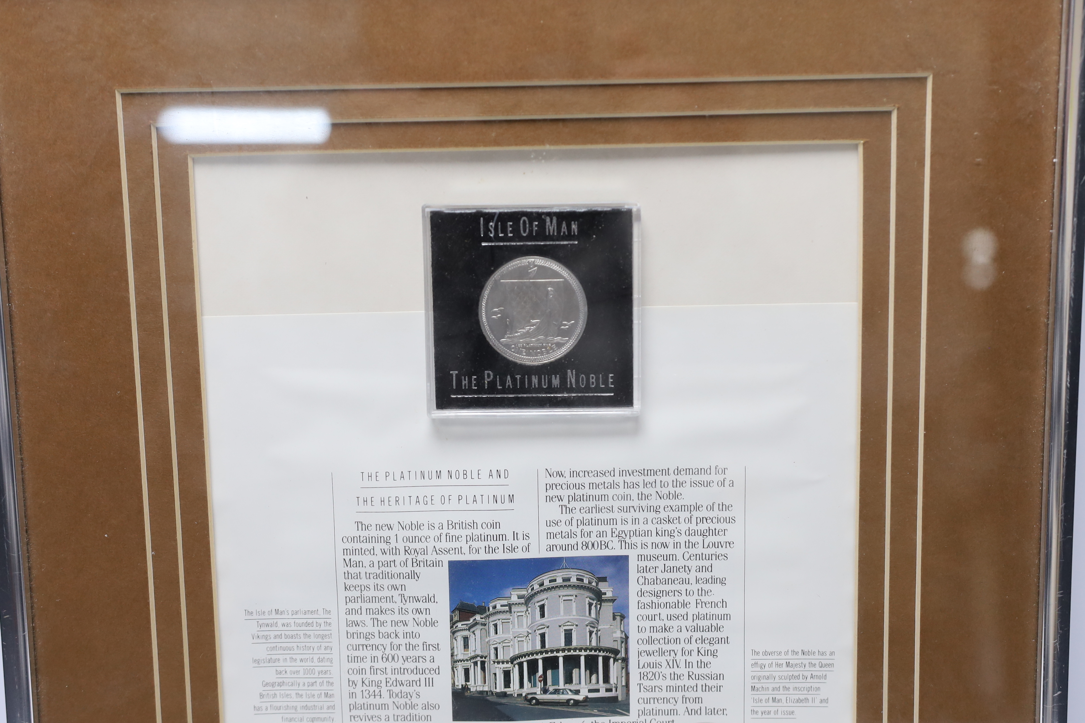 An Isle of Man 1oz. platinum one noble coin, framed display, 19.5cm x 24cm not including mount or frame